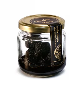 Peso neto: 40 gr. / 1.411 oz. Frasco de cristal, dentro hay fruta de trufa entera Impregnados en jugo