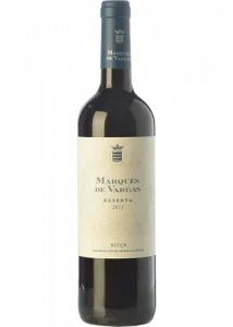 Botella de vino tinto, con cápsula de color negro, cuerpo de botella color negro. La etiqueta en la botella es de color blanco, escrito Luis Cañas Gran Reserva. Denominación de origen en Rioja.